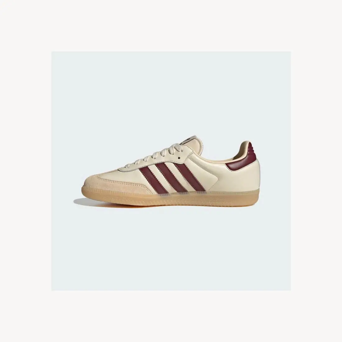 Giày sneaker beige sọc đỏ